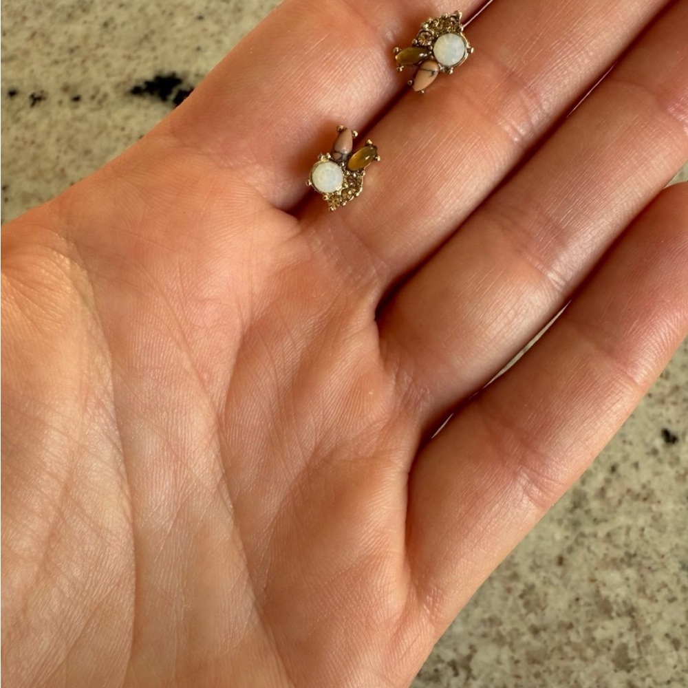Brown cream and gold colored stud earrings